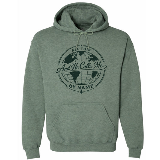 Green hoodie with a world map design and text on a white background