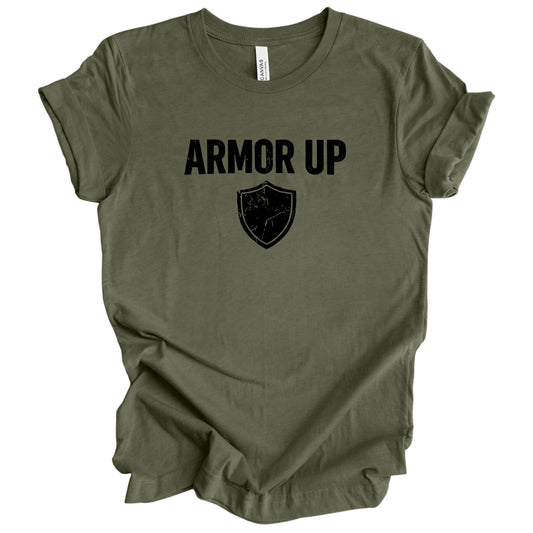 Green t-shirt with 'ARMOR UP' text and shield graphic on a white background